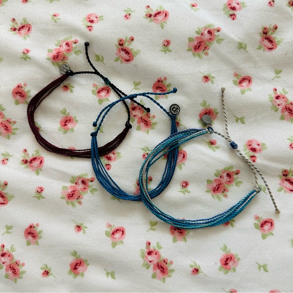 three pura vida bracelets